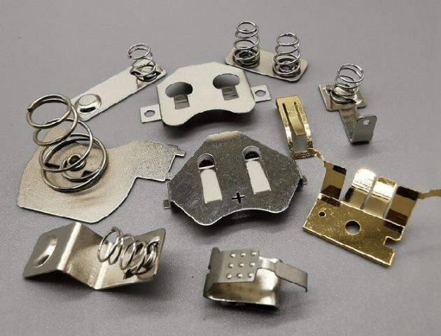 Stamped parts and casted parts